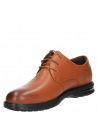 Punta redonda del zapato camel de cuero, diseñado para confort.