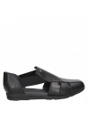 Sandalia casual de cuero negro para mujer, diseño cómodo y ligero.