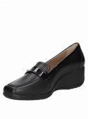 Zapato negro de cuero para mujer, estilo informal, con taco plano de 5 cm y punta redonda.