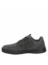 zapatilla negra de cuero y sintético para hombre, estilo informal, ideal para uso diario.
