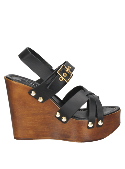 Sandalia negra de cuero, estilo informal, con taco cuña y punta abierta, ideal para ocasiones especiales.