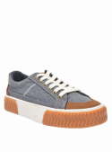 Zapatilla azul casual de mujer con suela gruesa zigzag y detalles en textil y cuero de estilo urbano.