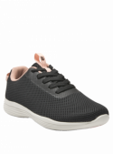 Zapatilla negra casual para mujer, con suela de goma plana y discreta, perfecta para largas caminatas y estilo athleisure.