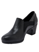 Elegante zapato negro de cuero para mujer, con elasticidad lateral, perfecto para combinar con jeans o faldas midi.