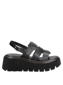 Sandalia chunky negra de mujer con plataforma robusta, combinable con atuendos casuales o semi-formales.