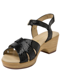 Elegante sandalia de cuero negro para mujer, con tiras cruzadas y tacón bloque, adecuada para un look chic.