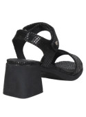 Elegante sandalia negra de cuero para mujer con tacón medio bloque, asegurando estabilidad y confort para uso diario.