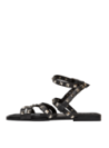 Calzado de cuero negro con tachas, perfecto para ocasiones informales o eventos casuales durante el día.
