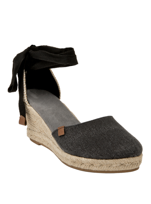 Elegante alpargata negra para mujer, cuña y cintas en tobillo, estilo desenfadado y chic.