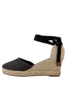 Calzado boho-chic, alpargata de yute negra para mujer, ideal con vestidos largos y faldas sueltas.