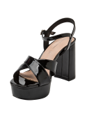 Sandalia de charol negro para mujer, moderna y elegante, ideal para eventos formales con plataforma y tacón grueso.