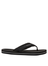 Sandalia masculina negra, diseño sencillo con tiras gruesas, combinable con ropa veraniega para un look desenfadado.