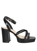 Calzado de cuero negro para mujer, sandalia con plataforma ancha, ideal para eventos semi-formales y look casual chic.