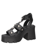 Sandalia negra de cuero para mujer con estilo casual rockero, adornada con tachuelas metálicas para un look punk atrevido.
