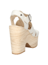 "Sandalia boho de cuero blanco para mujer, con correas cruzadas y plataforma
