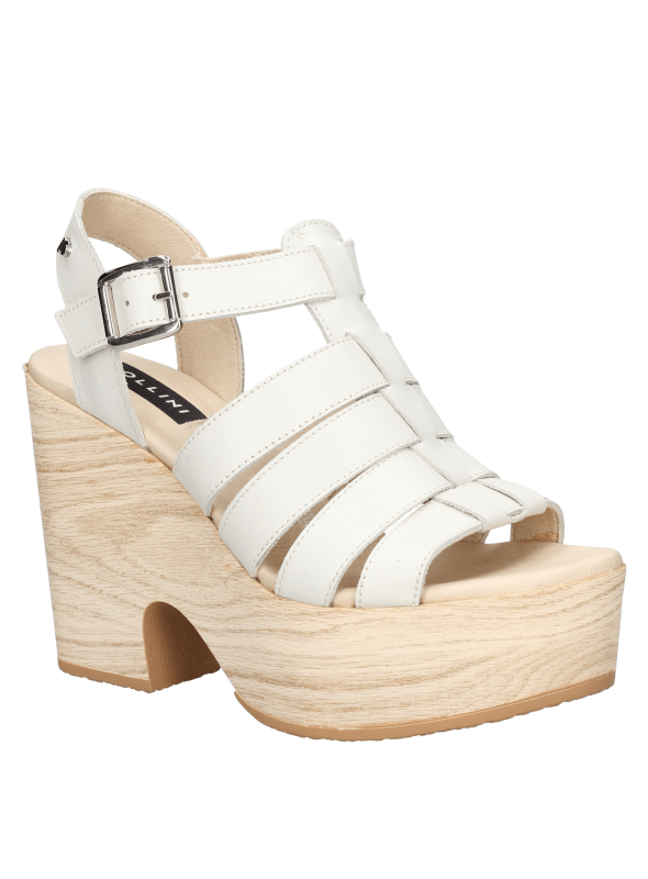 Calzado casual de cuero blanco para mujer, con correas ajustables y hebilla lateral, ideal para ocasiones informales.