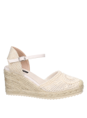 Calzado casual beige para mujer con suela de plataforma de cuerda, ideal para un look boho-chic en primavera.