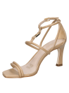 Sandalia beige de cuero para mujer, estilo casual, minimalista con tiras cruzadas delgadas y toque moderno.