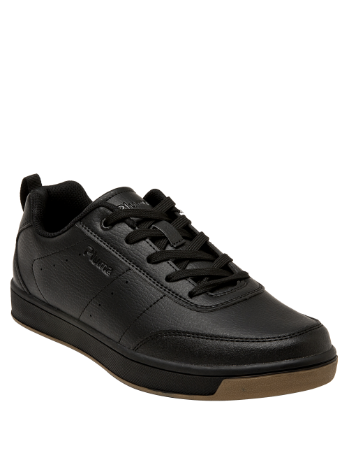 Zapatilla negra unisex de estilo colegial, corte bajo y aspecto elegante, ideal para combinar con jeans o ropa casual.