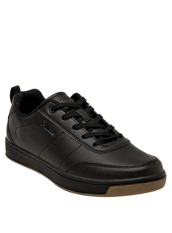 Zapatilla negra unisex de estilo colegial, corte bajo y aspecto elegante, ideal para combinar con jeans o ropa casual.
