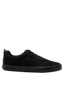 Zapatilla unisex negra textil con suela robusta y ligeramente elevada, perfecta para actividades diarias en la ciudad.