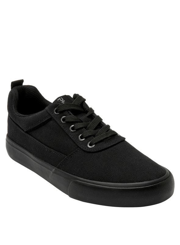 Zapatilla colegial unisex negra de diseño clásico con cordones y ojales metálicos, ideal para un look urbano y casual.