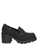 Zapato de mujer en cuero negro, estilo casual, perfecto para resaltar personalidad.