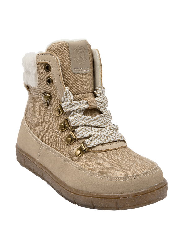 Suela gruesa del botín beige para niña, proporcionando estabilidad y tracción para actividades al aire libre.