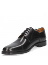 Zapato de cuero negro tipo Derby, diseño atemporal con puntera recta, ideal para un entorno profesional o cenas elegantes.