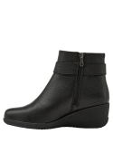 Botín de cuero negro para mujer, diseño casual, cómodo y resistente al frío y humedad.