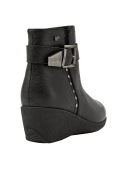 Botín negro de cuero para mujer, estilo casual, ideal para el invierno, con taco cuña de 7 cm.