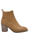 Botín camel de cuero para mujer, elegante y práctico, combina estilo y funcionalidad en invierno.