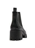 Botín Chelsea negro de mujer en cuero y textil, estilo moderno con taco bloque y punta redonda.