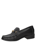 Mocasín negro de cuero para mujer, sofisticado y cómodo, combina elegancia clásica con tendencias contemporáneas.