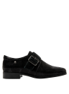 Zapato negro de cuero para mujer, estilo Oxford, combina un diseño clásico con toques contemporáneos.