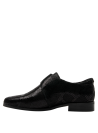 Elegante zapato de cuero negro para mujer, diseño Oxford clásico-moderno, ideal para ocasiones formales.