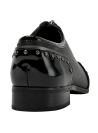 Zapato de cuero negro para mujer, estilo casual, con taco plano y punta puntiaguda.