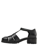 Sandalia casual de cuero negro con suela sólida y taco medio cuadrado, ideal para primavera-verano.