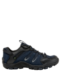 Zapatilla azul de cuero y mesh para hombre, ideal para actividades outdoor y uso diario.