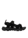 Sandalia negra de hombre casual en canvas con taco plano y punta abierta, ideal para verano.