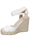 Alpargata blanca de mujer, estilo casual boho-chic, con diseño clásico de cuña y plataforma de yute trenzado.