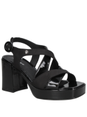 Sandalia negra de cuero para mujer con taco bloque de 8.5 cm y diseño casual sofisticado.