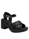 Sandalia femenina de cuero negro con taco bloque, combina estilo y confort.