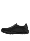 Calzado de cuero negro, tipo mocasín sin cordones, ideal para ocasiones formales, con suela gruesa y detalles decorativos.