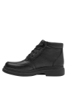Botín casual de cuero negro con cordones y suela gruesa, ideal para paseos en diversas superficies.