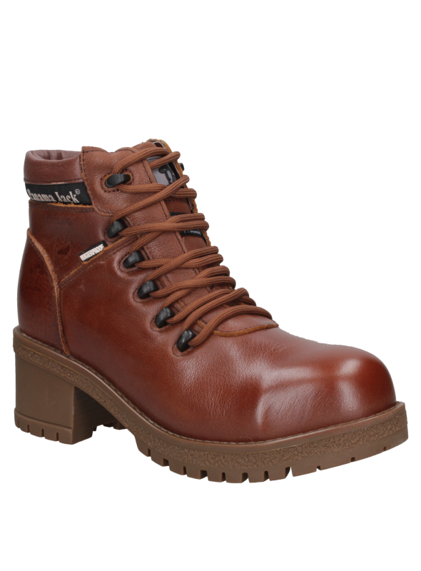 Zapato de seguridad negro para mujer, con puntera de composite y suela resistente a hidrocarburos.