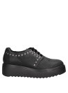 Zapato negro casual de cuero para mujer, perfecto para un estilo audaz y sofisticado con su plataforma y acabados únicos.