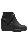 Botín casual de cuero negro para mujer, plataforma que añade altura y comodidad, perfecto para el uso diario.