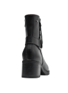 Botín de cuero negro para mujer, estilo moderno con toque clásico, suela antideslizante ideal para diversas superficies.