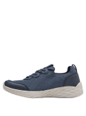 zapatilla azul casual de mujer con suela gruesa de material espumoso que proporciona amortiguación y comodidad al caminar.
